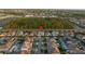 Aerial view of homes, tree line, and surrounding neighborhood, highlighting the property's location at 8017 Chilton Dr, Orlando, FL 32836