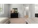 Bedroom featuring two beds, a dresser with a mirror, and neutral walls at 8017 Chilton Dr, Orlando, FL 32836
