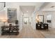 Bright entryway showcasing wood floors, staircase, and decorative furnishings at 8017 Chilton Dr, Orlando, FL 32836
