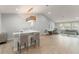 This living space has high ceilings and a long sofa for entertaining at 8017 Chilton Dr, Orlando, FL 32836
