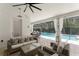 Seating area that looks onto the pool and spa at 8017 Chilton Dr, Orlando, FL 32836