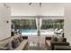 Seating area that looks onto the pool and spa at 8017 Chilton Dr, Orlando, FL 32836