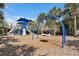 Fun playground featuring a swing set, slide, and climbing structures for to enjoy outdoor activity at 8017 Chilton Dr, Orlando, FL 32836