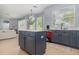 Kitchen featuring an island and a decorative dishwasher at 12651 Winding Woods Ln, Orlando, FL 32832
