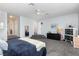 Bright main bedroom with carpet, view of bathroom, and ensuite at 12651 Winding Woods Ln, Orlando, FL 32832