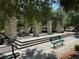 Community pavilion with stone pillars and seating areas, perfect for gatherings and relaxation in a serene setting at 12651 Winding Woods Ln, Orlando, FL 32832