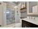 Modern bathroom featuring a stylish glass shower with decorative tile accents and updated fixtures at 13710 Lake Cawood Dr, Windermere, FL 34786