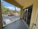 Screened balcony overlooking lush greenery with sliding door access to the interior at 1420 Lake Shadow Cir # 9207, Maitland, FL 32751