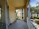Outdoor screened patio with building and walkway views at 1420 Lake Shadow Cir # 9207, Maitland, FL 32751