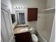Full bathroom with cherry vanity, granite countertop, and tub with shower at 1420 Lake Shadow Cir # 9207, Maitland, FL 32751