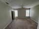 Spacious bedroom with two windows, ceiling fan, carpeted floor, and closet at 1420 Lake Shadow Cir # 9207, Maitland, FL 32751