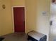 A red front door, with a digital lock, and a storm proof container at the entrance at 1420 Lake Shadow Cir # 9207, Maitland, FL 32751