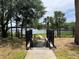 A lake view with palms and shade trees from a landscaped community picnic area at 1420 Lake Shadow Cir # 9207, Maitland, FL 32751