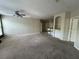 Spacious living room featuring neutral paint, ceiling fan and carpet flooring at 1420 Lake Shadow Cir # 9207, Maitland, FL 32751