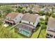 Aerial view of backyard with pool and backyard fence at 14883 Golden Sunburst Ave, Orlando, FL 32827