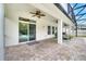 Covered patio with ceiling fan, brick floor and view of pool at 14883 Golden Sunburst Ave, Orlando, FL 32827