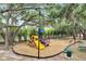 Community playground with climbing structure, slide, and swings at 14883 Golden Sunburst Ave, Orlando, FL 32827