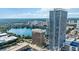 Stunning aerial view overlooking a serene lake and modern buildings with a beautiful skyline backdrop at 150 E Robinson St # 801, Orlando, FL 32801