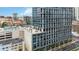 Modern high-rise with balconies, a rooftop pool, and tennis court offering luxury living at 150 E Robinson St # 801, Orlando, FL 32801