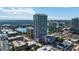 Wide aerial capture of the building with lake views, showcasing its prime location in a bustling urban environment at 150 E Robinson St # 801, Orlando, FL 32801
