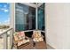 Charming balcony view with outdoor seating; a perfect spot to relax and enjoy city living at 150 E Robinson St # 801, Orlando, FL 32801