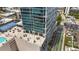 Modern high-rise building with balconies, a tennis court, and rooftop pool, offering luxurious amenities at 150 E Robinson St # 801, Orlando, FL 32801