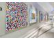 Well-lit hallway featuring modern artwork and sleek design, enhancing the building's aesthetic appeal at 150 E Robinson St # 801, Orlando, FL 32801