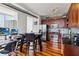 Contemporary kitchen features stainless steel appliances, sleek cabinets and a breakfast bar with table at 150 E Robinson St # 801, Orlando, FL 32801