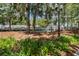 Lake Eola Park with lush landscaping, waterfront walkway, and various vendor tents at 150 E Robinson St # 801, Orlando, FL 32801