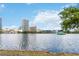 Picturesque view of 150 E Robinson Street, #801, situated across from a tranquil lake at 150 E Robinson St # 801, Orlando, FL 32801