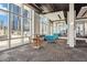 Bright lounge area with floor-to-ceiling windows and comfortable seating, offering cityscape views at 150 E Robinson St # 801, Orlando, FL 32801