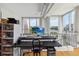 Contemporary home office space with a large window overlooking a serene lake view at 150 E Robinson St # 801, Orlando, FL 32801