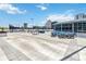 Inviting rooftop lounge with grilling area, dining tables, and comfortable seating, ideal for entertaining guests at 150 E Robinson St # 801, Orlando, FL 32801