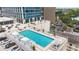 Stunning rooftop pool with lounge seating and city views, perfect for relaxation and entertainment at 150 E Robinson St # 801, Orlando, FL 32801