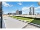 Open rooftop terrace featuring artificial turf and city views, great for outdoor activities at 150 E Robinson St # 801, Orlando, FL 32801