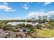 Stunning aerial view showcasing lake, park, and cityscape; an unbeatable backdrop for luxurious living at 150 E Robinson St # 801, Orlando, FL 32801