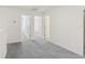 Upstairs hallway with neutral carpet and white doors at 16419 Bird Of Paradise Ave, Clermont, FL 34714