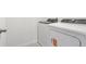 Laundry room featuring side-by-side washer and dryer at 16419 Bird Of Paradise Ave, Clermont, FL 34714