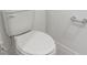 Close up on toilet, and toilet paper holder at 16419 Bird Of Paradise Ave, Clermont, FL 34714
