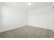 Bedroom featuring neutral carpeting, blank walls, and overhead lighting at 16430 Bird Of Paradise Ave, Clermont, FL 34714