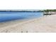 Enjoy a sandy beach with clear water for swimming and sunbathing at 2446 Sweetwater Country Club Dr, Apopka, FL 32712