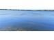 Serene lake view, perfect for lakeside living and relaxation at 2446 Sweetwater Country Club Dr, Apopka, FL 32712
