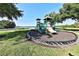 Community playground with modern equipment, providing a fun recreational space for families at 2446 Sweetwater Country Club Dr, Apopka, FL 32712