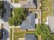 Aerial view of the home showing the roof, yard, and surrounding neighborhood at 360 Coventry Estate Blvd, Deltona, FL 32725