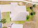 Aerial view of a home with a three-car garage and well-kept backyard at 829 Terranova Rd, Winter Haven, FL 33884