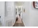 Home hallway featuring stylish flooring, wall decor, and access to other rooms at 829 Terranova Rd, Winter Haven, FL 33884