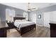Spacious bedroom featuring wood-style floors, and two windows with natural lighting at 829 Terranova Rd, Winter Haven, FL 33884