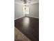 Cozy dining area with dark wood flooring and a ceiling fan at 8347 Willowwood St, Orlando, FL 32818