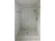 Modern bathroom shower featuring elegant tile work and contemporary fixtures at 8347 Willowwood St, Orlando, FL 32818