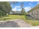 Lush backyard featuring a covered screened in pool at 8740 Ingleton Ct, Orlando, FL 32836